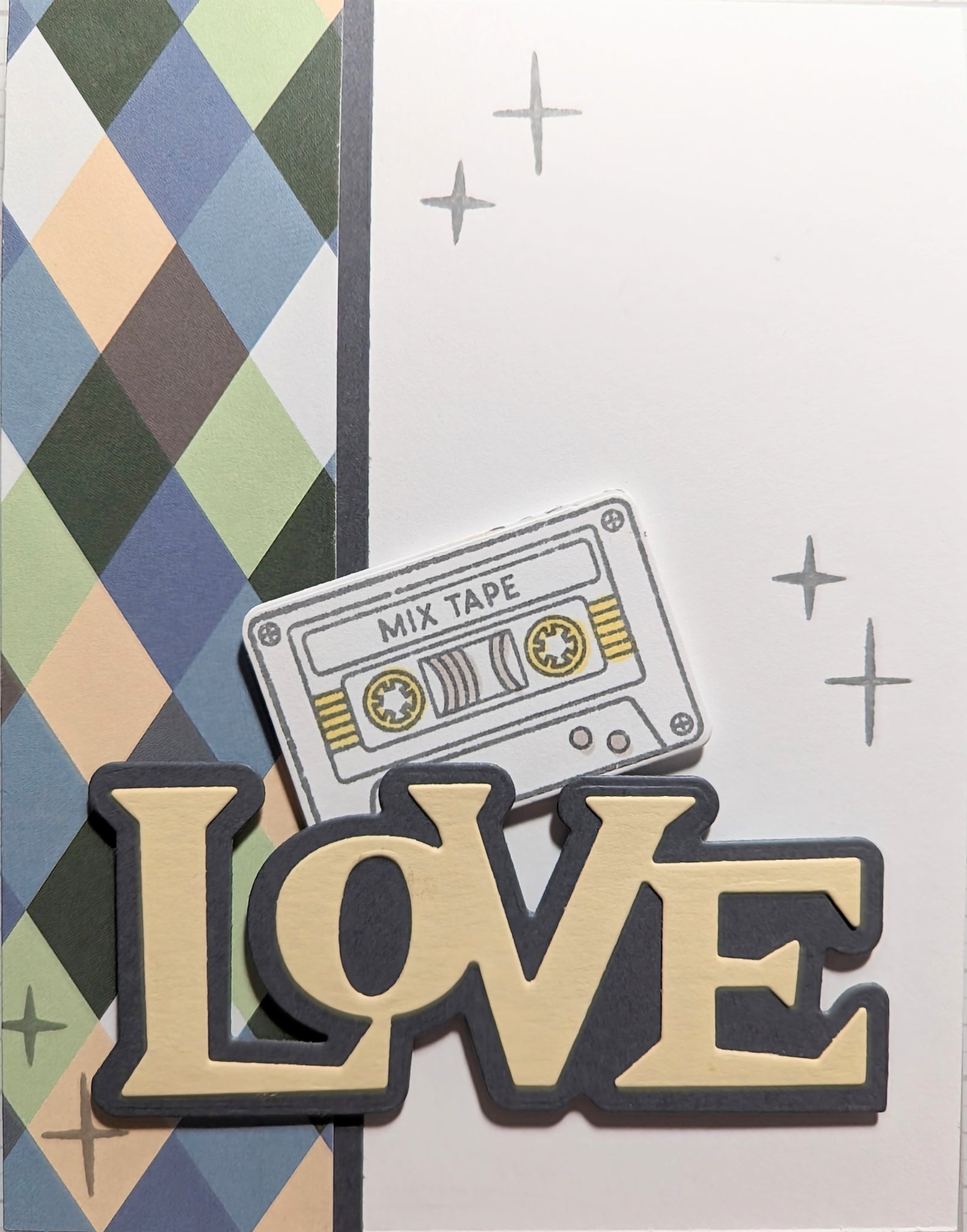 Argyle pattern on side with a cassette tape and the word love in a 50s style font