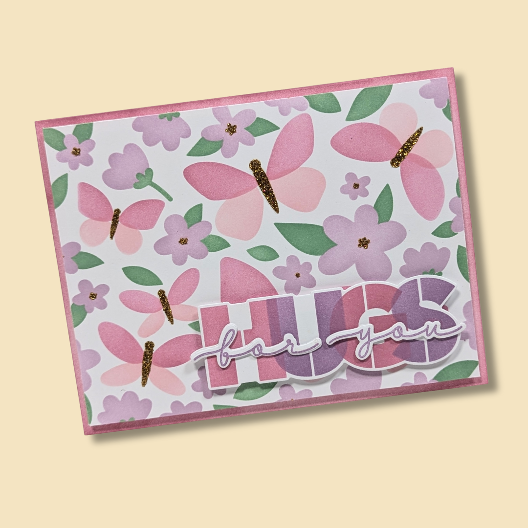 Spring card with butterflies and flowers created using the Waffle Flower Spring Breeze Stencil Set with Overlapping Hugs Die n Stencil